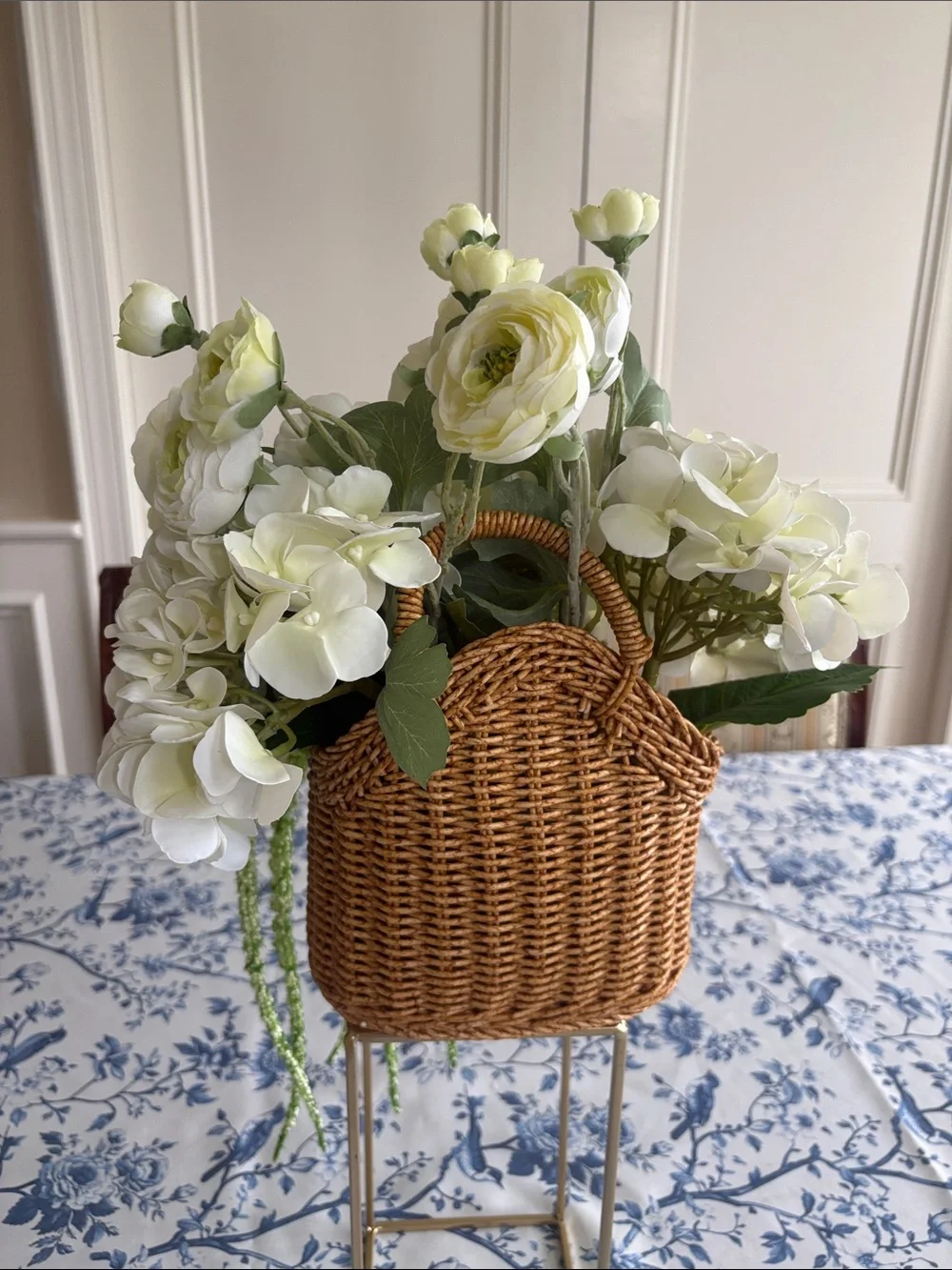 Woven Basket Floral Arrangement with White Hydrangeas and Green Accents